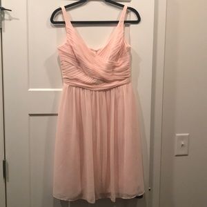 Light pink bridesmaid dress.